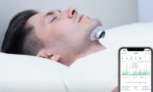 Person using the Snore Circle YA4200 Electronic Muscle Stimulator Plus.