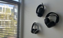 Picture of gaming headsets hanging on a wall