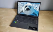 Acer Aspire 5 laptop with baby seal as desktop background