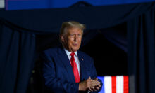 Former U.S. President Donald Trump enters Erie Insurance Arena for a political rally while campaigning for the GOP nomination in the 2024 election on July 29, 2023 in Erie, Pennsylvania.