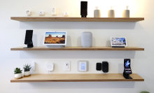 a set of shelves covered with Google Home-ready devices
