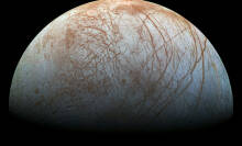 The cracked ice shell of Jupiter's moon Europa.