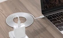 charging cable plugged into an Apple laptop