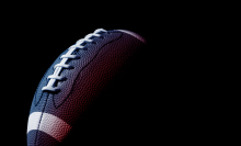 close up of football with dramatic lighting