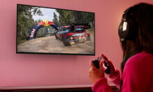 girl playing a video game on the Amazon Fire 40-inch TV