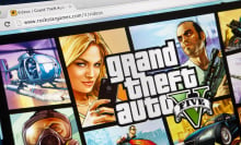 Close up iMac screen with Grand Theft Auto V website in browser
