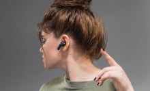 woman wearing earbuds