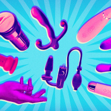 a hand showcasing an arc of sex toys