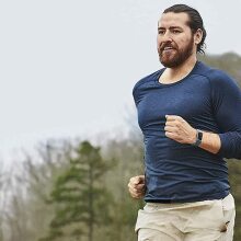 Man running with a fitbit on his wrist