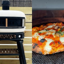 White pizza oven next to a Neapolitan style pizza