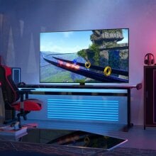 Samsung TV in room with colorful LED lights near gaming chair