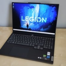 Lenovo Legion Slim 7i gaming laptop on desktop with open screen