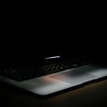 Laptop in dark room