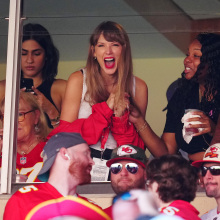 Taylor Swift beaming at the Kansas City Chiefs game on Sept. 24. 