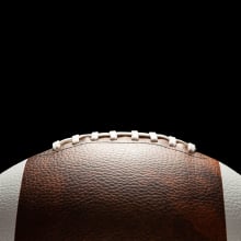 extreme close up of football with black background