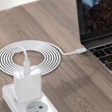 charging cable plugged into an Apple laptop