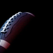 close up of football with dramatic lighting