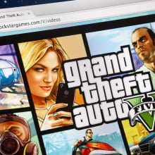 Close up iMac screen with Grand Theft Auto V website in browser