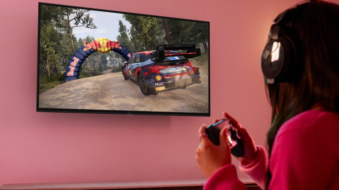 girl playing a video game on the Amazon Fire 40-inch TV