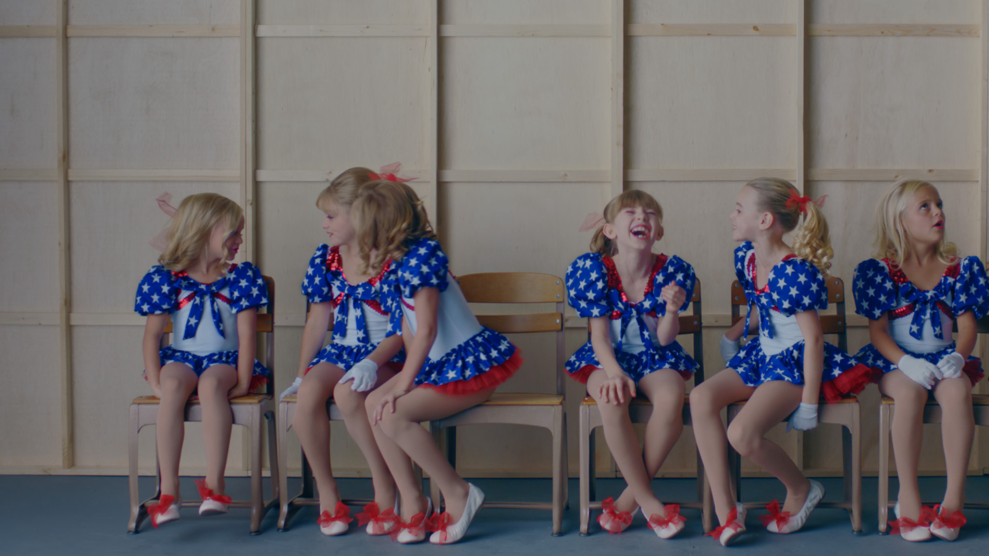 A group of girls all dressed as JonBenet Ramsay.