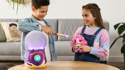Kids playing with Magic Mixies crystal ball toy and wand