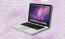 refurbished MacBook Pro with purple squiggly lines in background