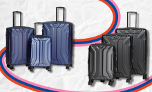 Vittorio Transmover luggage in black and blue with colorful swirl in background
