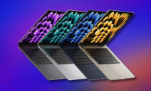 Four 15-inch M2 MacBook Airs overlaid on each other over a multi-colored background