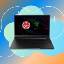 black razer blade 15 gaming laptop with a blue and orange backdrop