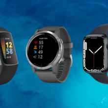 Three fitness trackers on a blue background