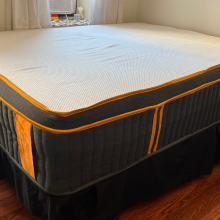tall mattress with spots of copper on the surface