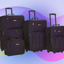 4-piece luggage set in deep purple against a purple, pink, blue, and yellow background
