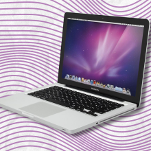 refurbished MacBook Pro with purple squiggly lines in background
