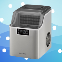 insignia ice-maker against blue background with white dots