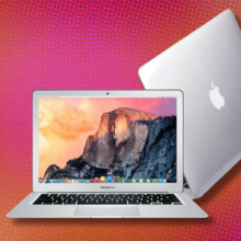 The 2017 MacBook Air shown from two angles, over an orangey-pink background