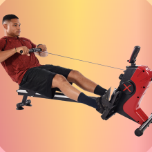 man using magnetic rower