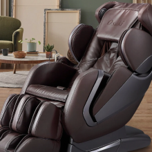 The Titan Pro Alpha massage chair in a brownish color standing in a dining room setting