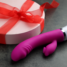 Sex toy beside holiday box 