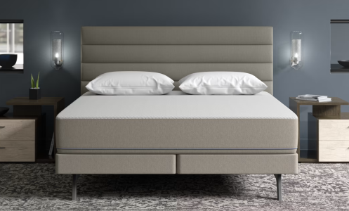 Sleep Number mattress and bed frame by nightstands and lamps