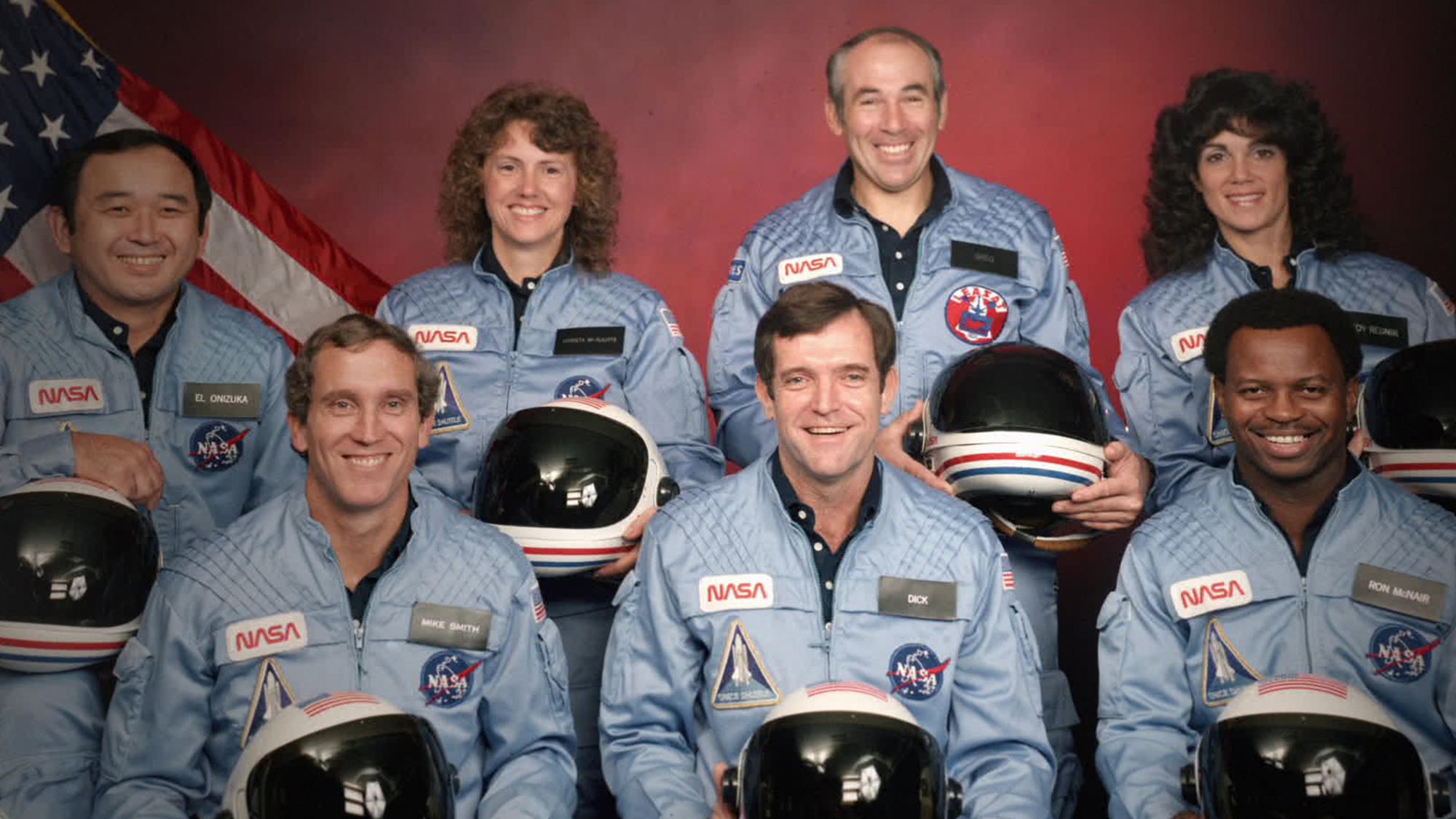 The Challenger 7 flight crew: Ellison S. Onizuka; Mike Smith; Christa McAuliffe; Dick Scobee; Gregory Jarvis; Judith Resnik; and Ronald McNair.