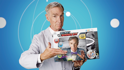 Bill Nye holding the Bill Nye VR Science Kit.